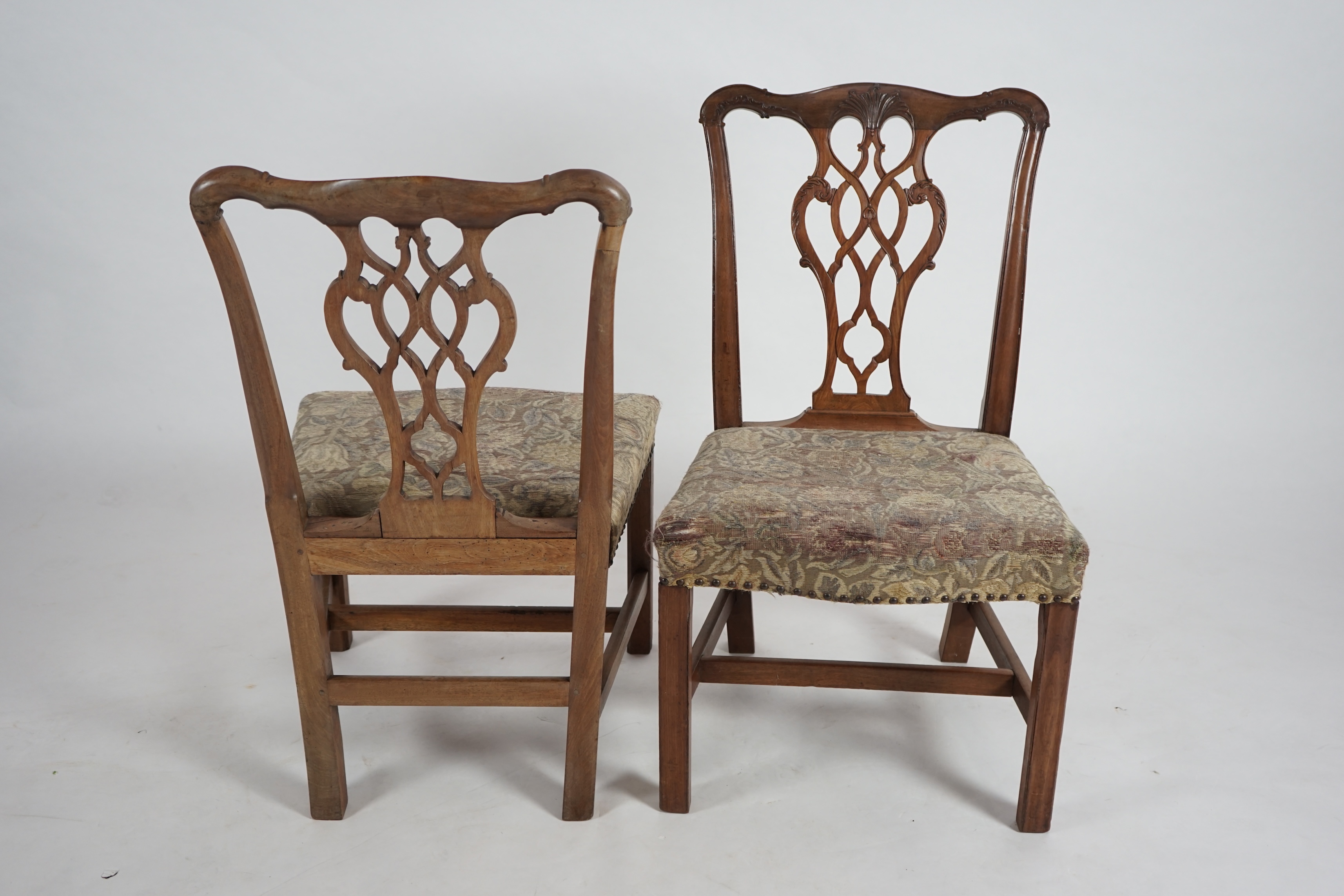 A pair of George III Chippendale style mahogany dining chairs